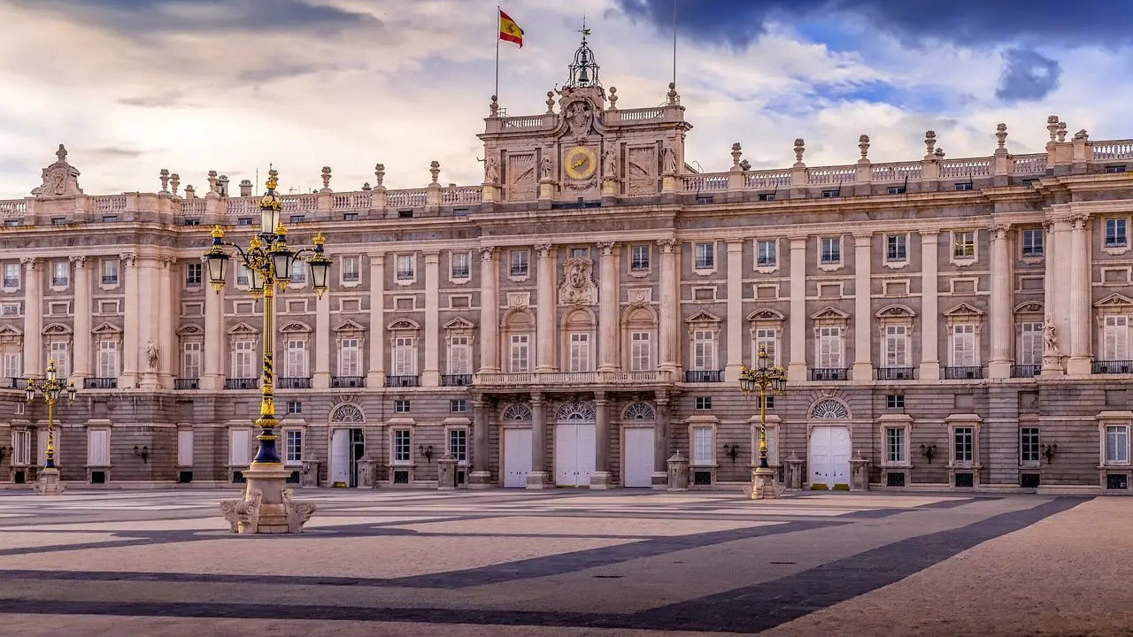 The Royal Palace of Madrid, showcasing Spain’s grand heritage and reflecting tax policies like the ‘Mbappé Law’ for elite players.